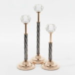 ست-سه‌تکه-شمعدان-مشکی-و-طلایی-با-سر-کریستالی-تراش‌دار