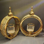 شمعدان-دکوراتیو-حلقه‌ای-طلایی-با-شیشه-آبگز-(2)